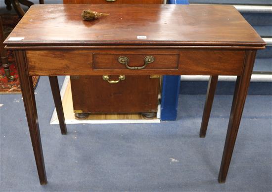 A George III mahogany folding top tea table W.91cm